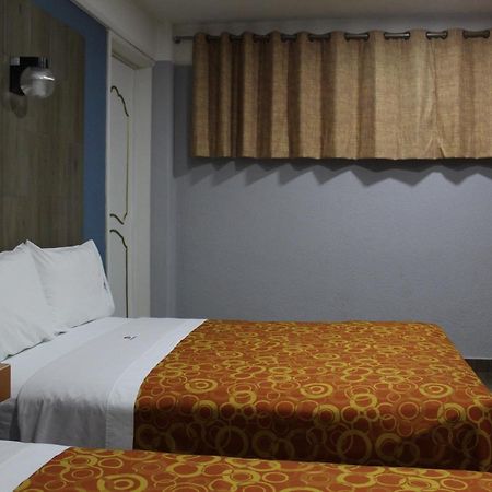 פואבלה Hotel Central מראה חיצוני תמונה