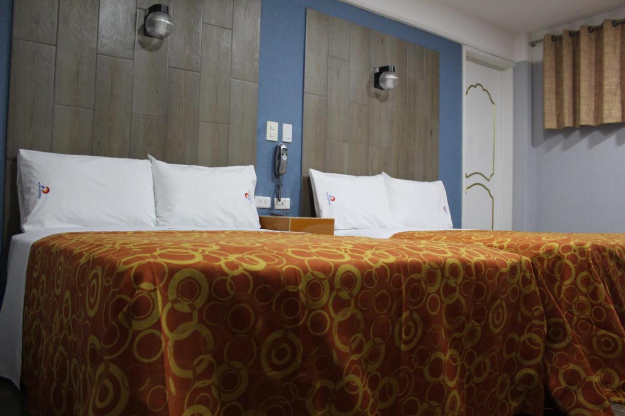 פואבלה Hotel Central מראה חיצוני תמונה