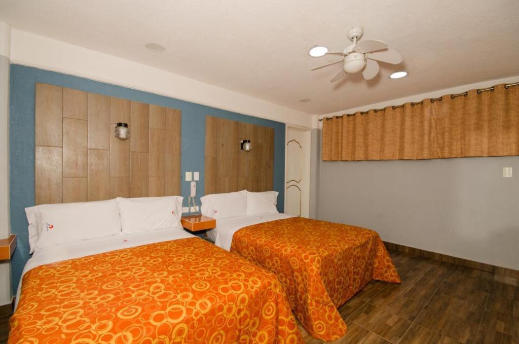 פואבלה Hotel Central מראה חיצוני תמונה