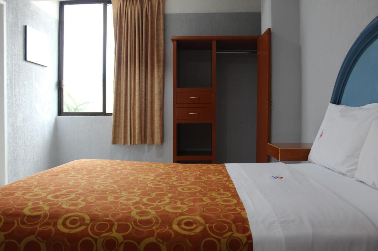 פואבלה Hotel Central מראה חיצוני תמונה