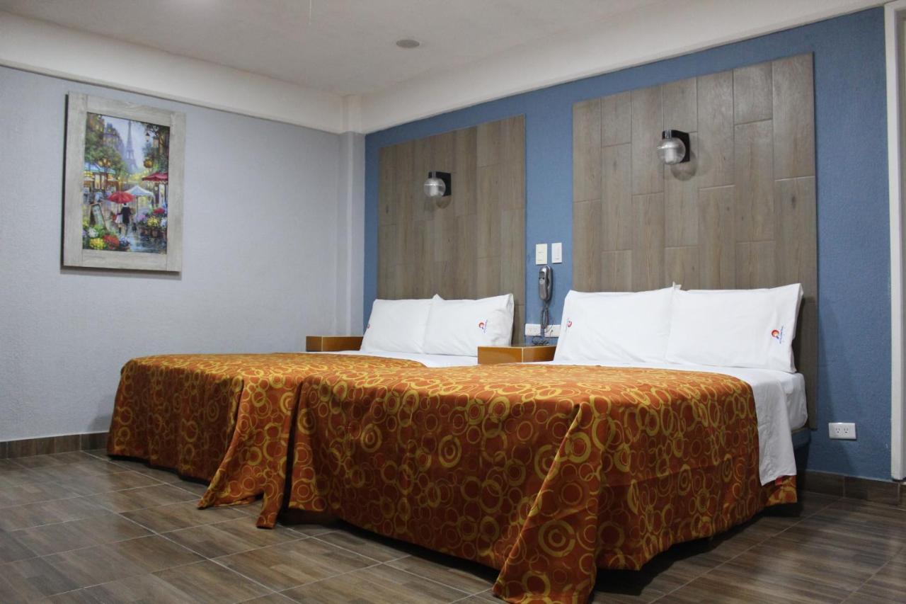 פואבלה Hotel Central מראה חיצוני תמונה