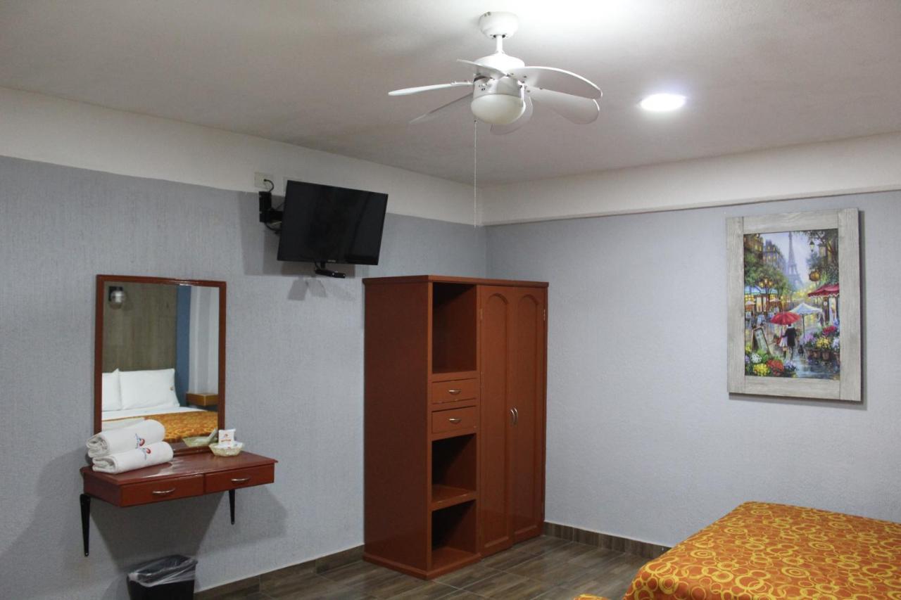 פואבלה Hotel Central מראה חיצוני תמונה